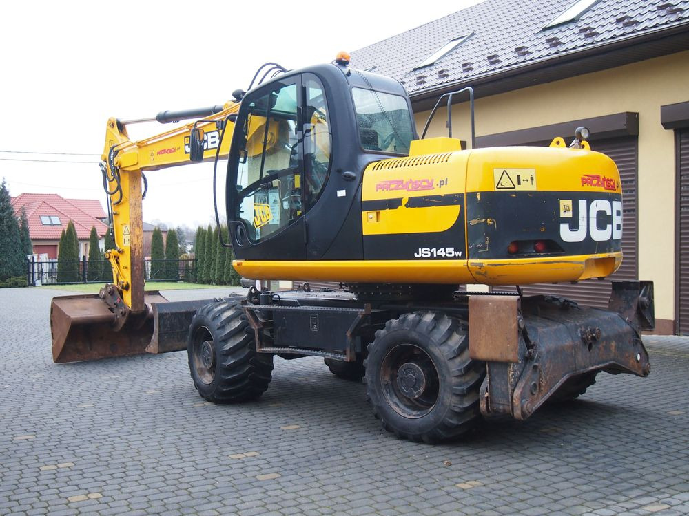 휠 굴삭기 Koparka kołowa JCB JS145W 2011 Koparka JCB : 사진 13