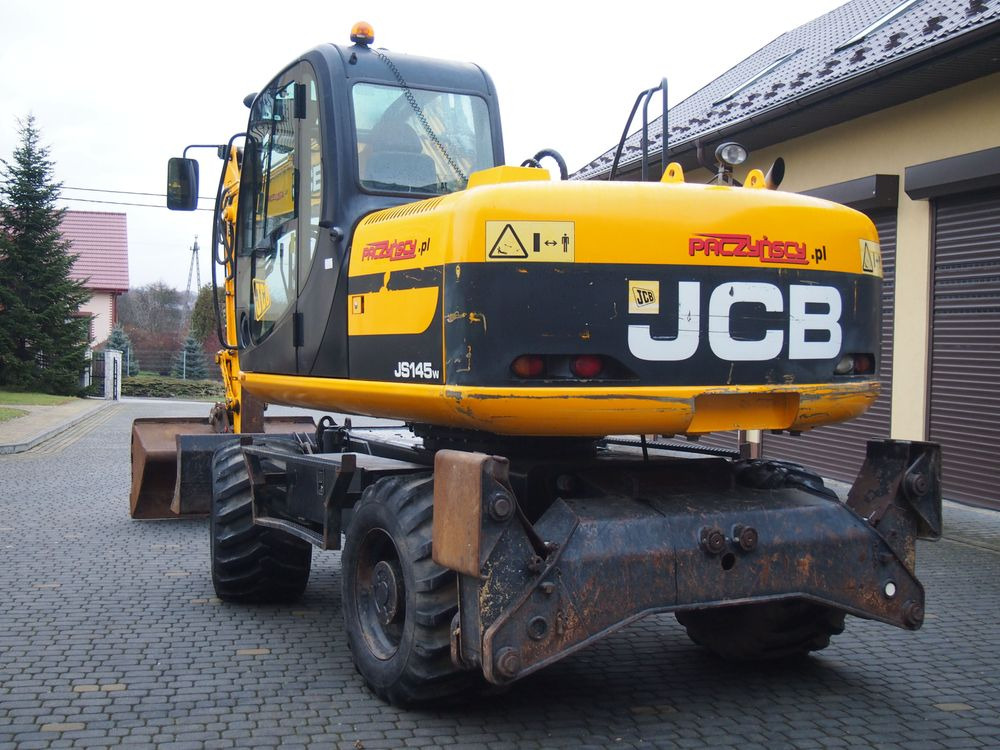 휠 굴삭기 Koparka kołowa JCB JS145W 2011 Koparka JCB : 사진 12