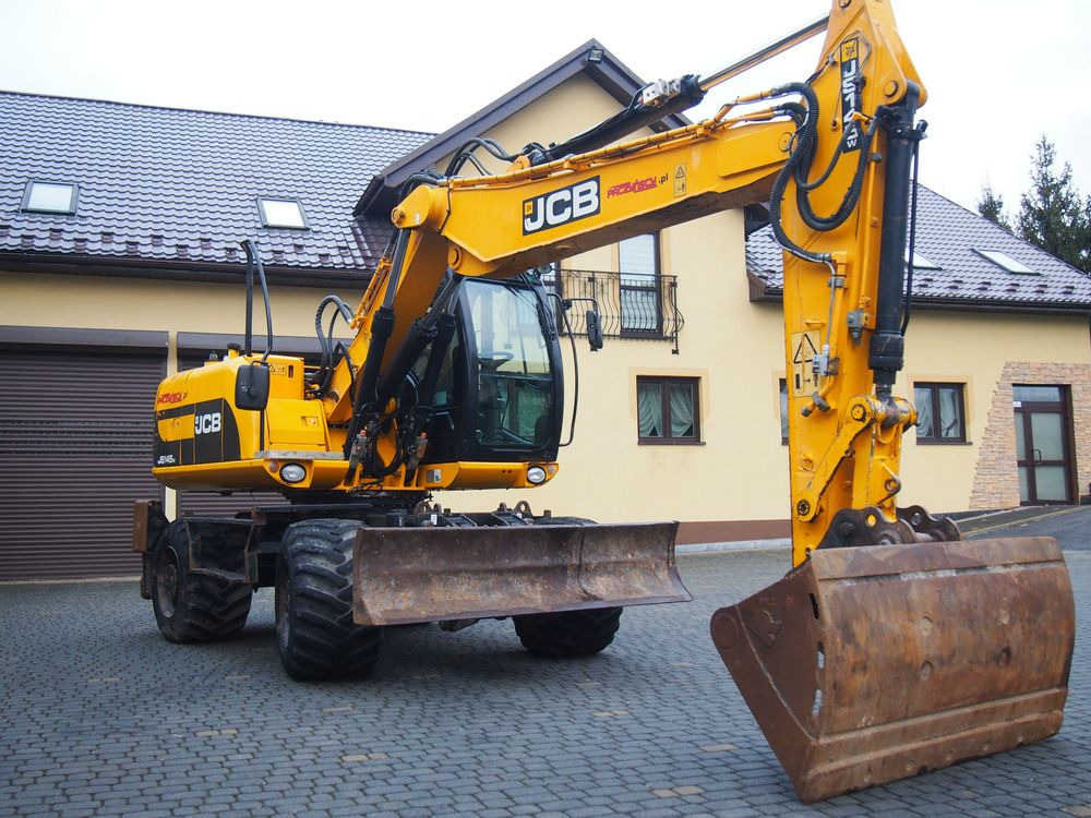 휠 굴삭기 Koparka kołowa JCB JS145W 2011 Koparka JCB : 사진 7