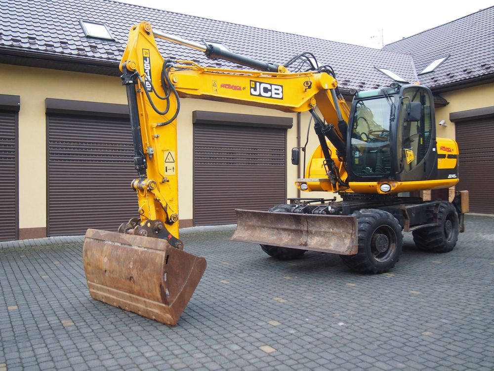 휠 굴삭기 Koparka kołowa JCB JS145W 2011 Koparka JCB : 사진 11