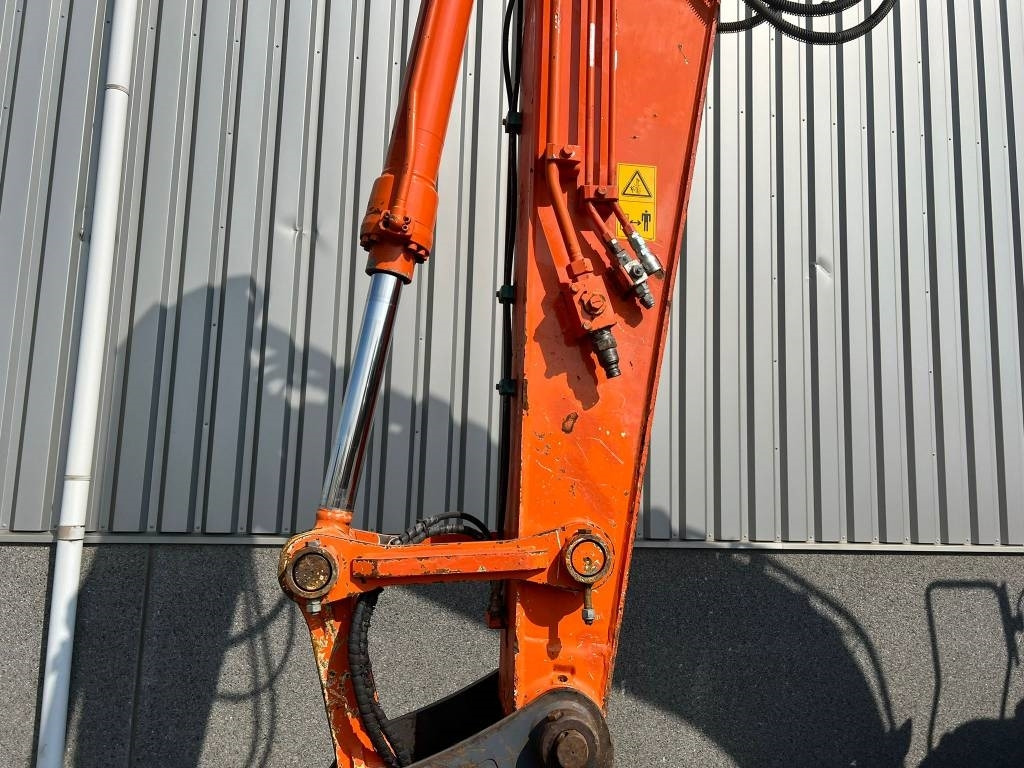 휠 굴삭기 Hitachi ZX 140 W-5 : 사진 25