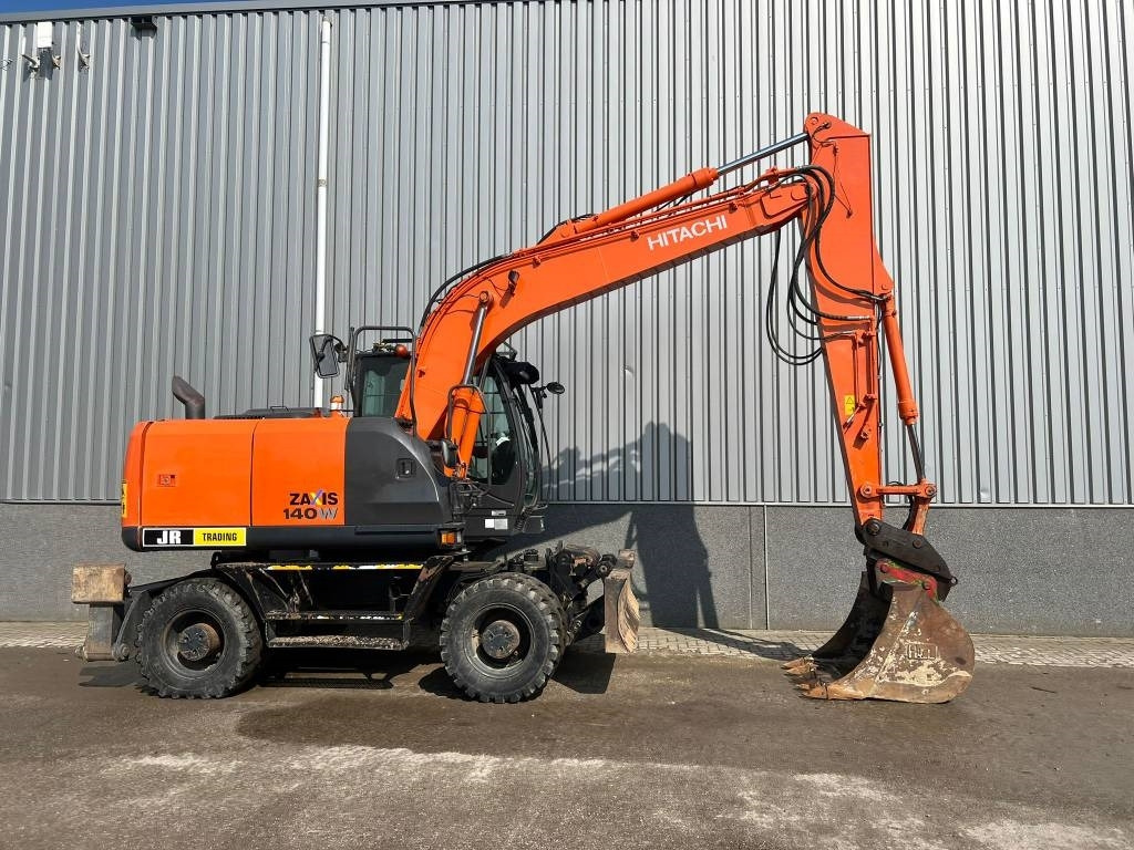 휠 굴삭기 Hitachi ZX 140 W-5 : 사진 7